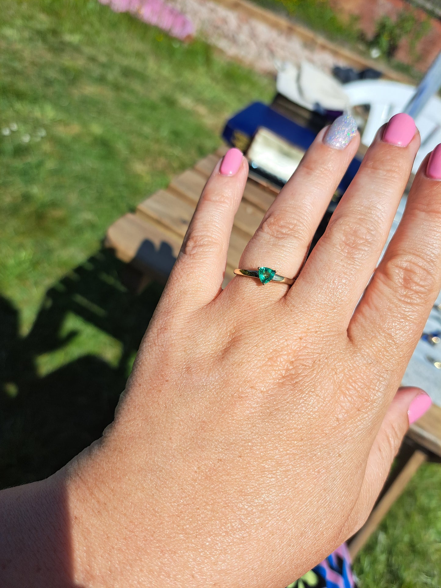 Triangular cut Emerald in 9ct Yellow Gold