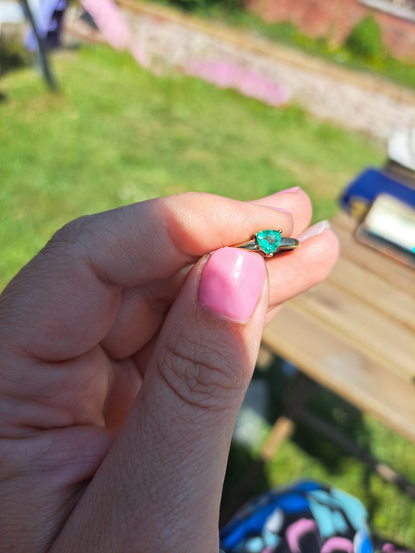 Triangular cut Emerald in 9ct Yellow Gold